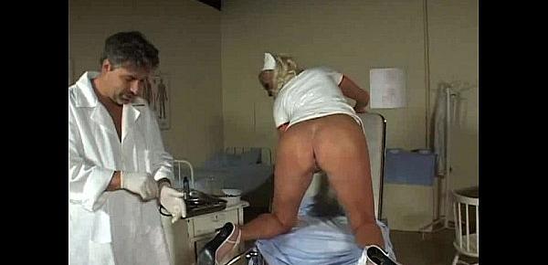  Blonde nurse babe gets a white liquid put into her ass